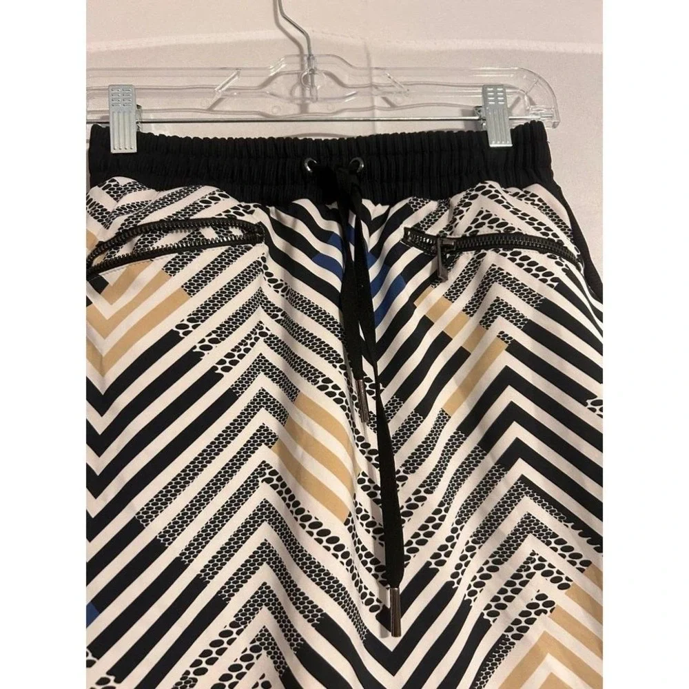 Tall brand tennis/pickleball skort like new XS‎ w pockets floral pleaded